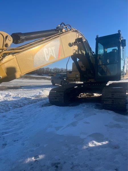  2014 CAT 323F L at Conquest Equipment Saskatchewan