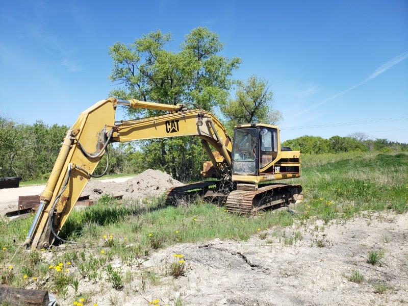  1994 CAT 320 L at Conquest Equipment Manitoba