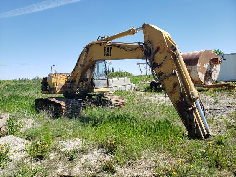  1994 CAT 320 L at Conquest Equipment Manitoba