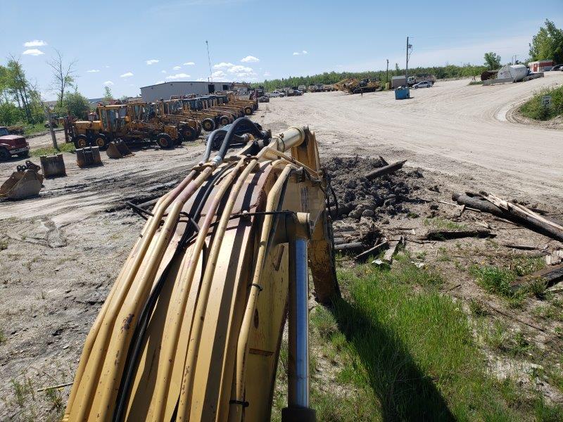  1994 CAT 320 L at Conquest Equipment Manitoba
