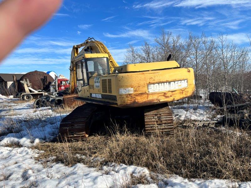  1994 DEERE 790E LC at Conquest Equipment Saskatchewan