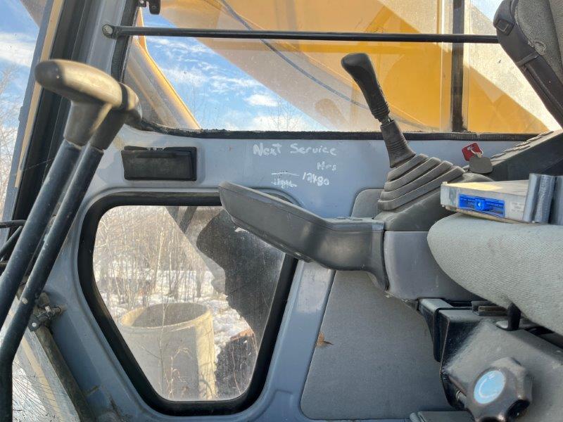  1994 DEERE 790E LC at Conquest Equipment Saskatchewan