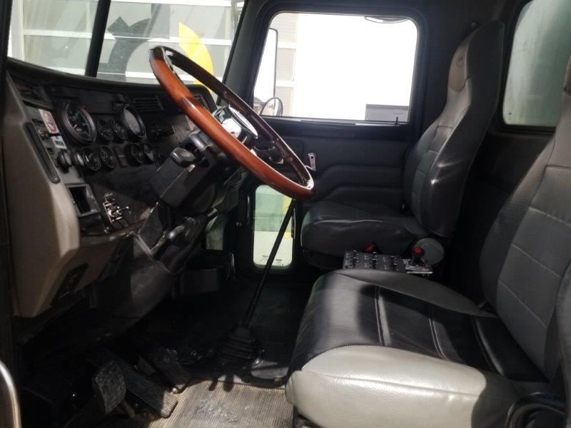  2010 Peterbilt 335 at Conquest Equipment Alberta