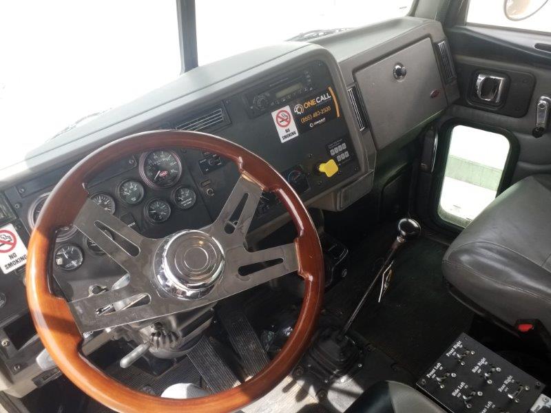  2010 Peterbilt 335 at Conquest Equipment Alberta