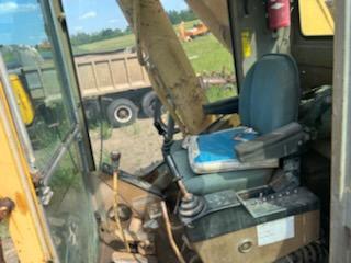  1984 CAT 245 at Conquest Equipment Minnesota
