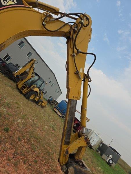  2005 CAT 420D at Conquest Equipment North Dakota