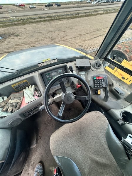  2011 DEERE 300DT at Conquest Equipment Saskatchewan